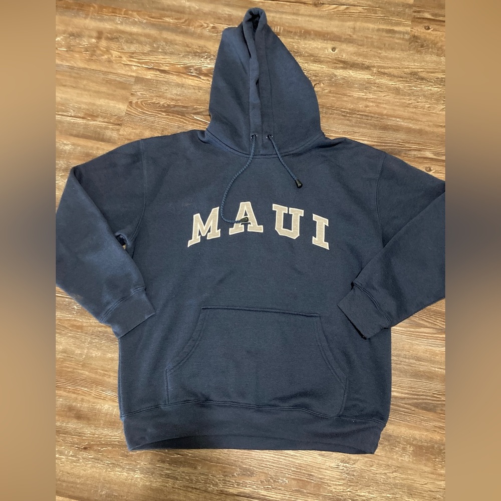 This is a navy blue Maui sweatshirt I got in Hawaii, it’s size medium and thin